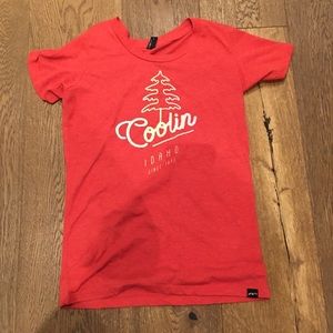 Red techstyles size small that says “Coolin Idaho sense 1893